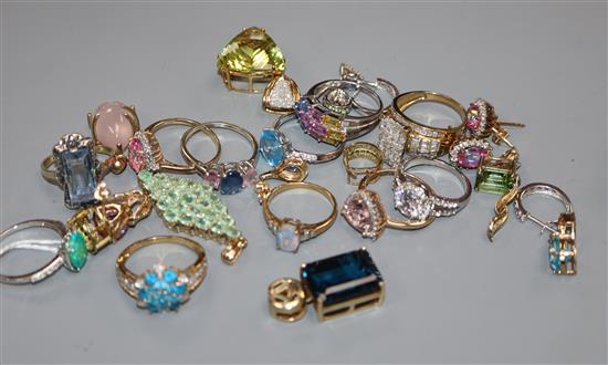 Eight assorted modern 9ct gold and gem set dress rings, seven similar assorted 9k and gem set pendants etc.